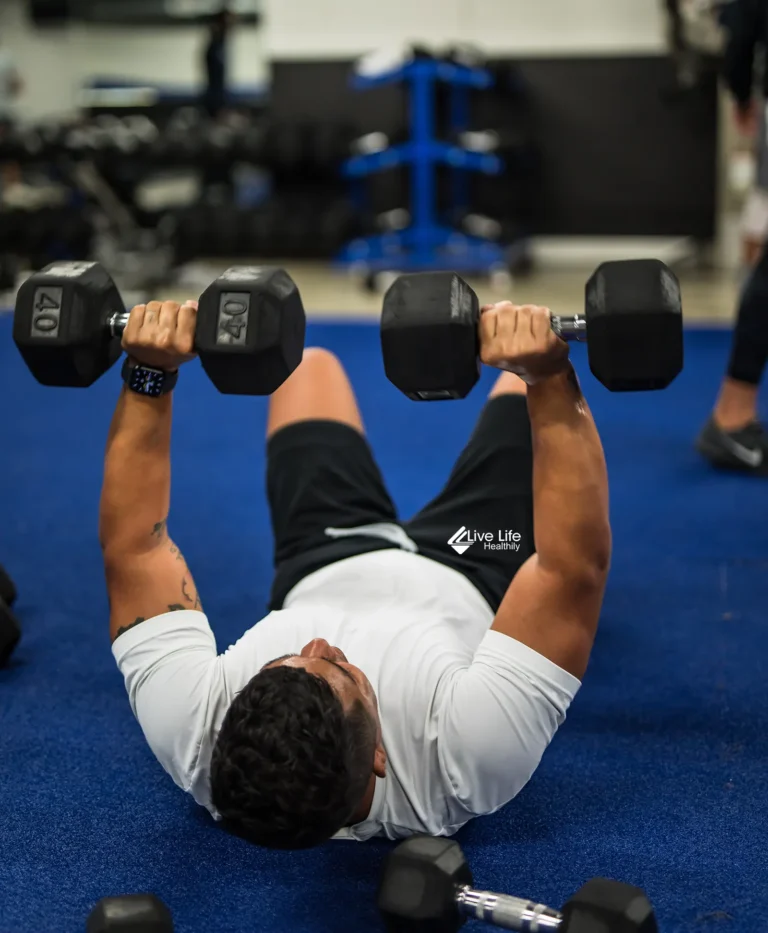 supersets featured image - man training with dumbbells